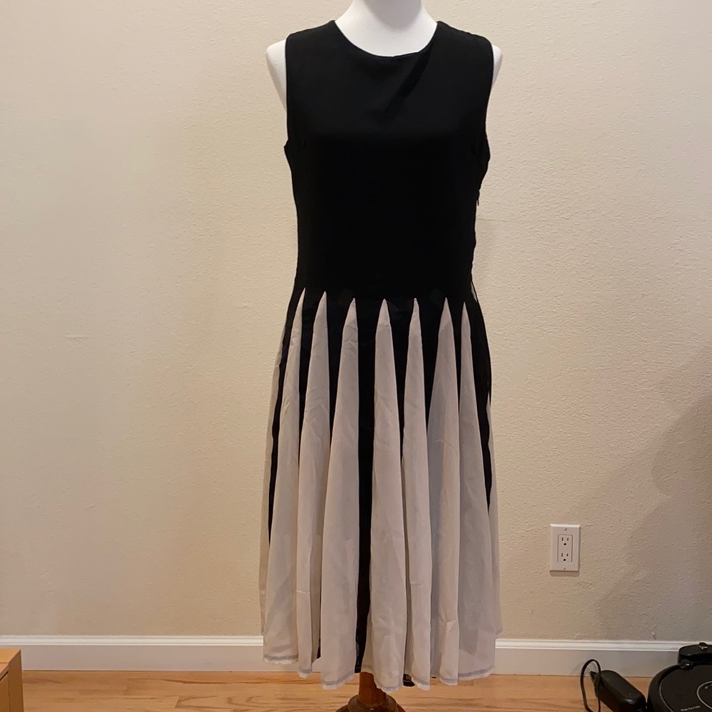 Black dress with white pleated detail